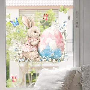 Detail of watercolor Easter bunny window cling with colorful egg and floral accents