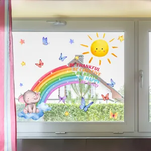 Detail of watercolor rainbow and elephant static window stickers with inspirational text