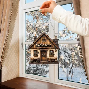Close-up of 2D flat acrylic cottage welcome sign with winter landscape background