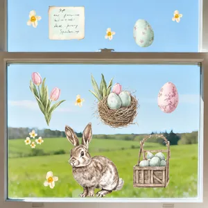Detailed Easter window decals featuring realistic rabbits, tulips, and colorful eggs on glass