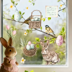 Detail of vintage hand-painted Easter window stickers with rabbits and eggs on glass