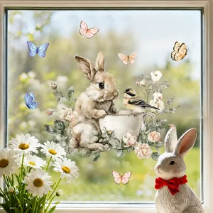 Close-up of Easter static window clings featuring cartoon rabbits and watercolor roses