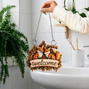 Detailed view of 2D flat acrylic forest fox welcome sign with silver hanging chain