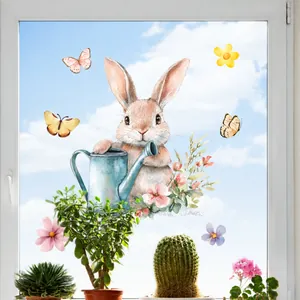 Detailed watercolor bunny window decal showing an Easter rabbit with blue watering can