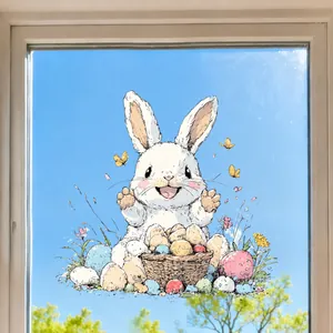 Detail of Easter bunny and colorful eggs window sticker on a glass door background