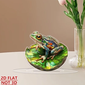 Detailed view of 2D flat acrylic frog ornament on lily pad with stained glass texture