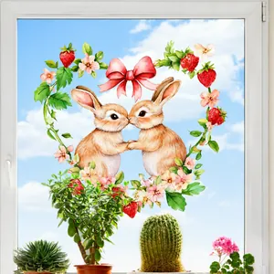 Watercolor bunny heart wreath window sticker on glass with garden background view