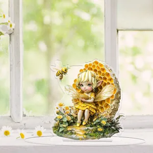 Detail view of 2D acrylic fairy ornament showing vibrant floral and beehive illustration