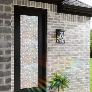 Rainbow floral static cling window film on black frame door with privacy frosting effect