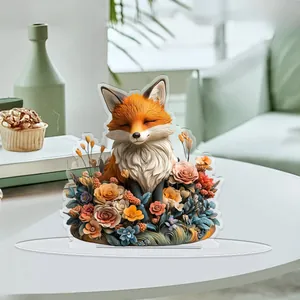 Detailed view of 2D flat acrylic fox ornament with floral patterns on a desk