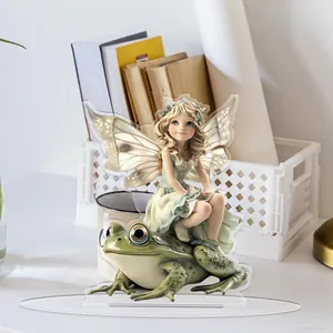 Detailed 2D flat acrylic ornament featuring a fairy girl riding a frog with desk props