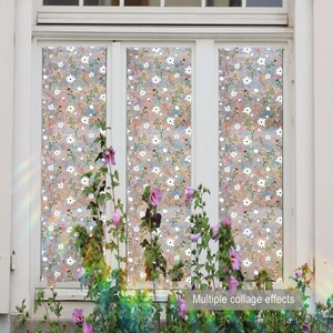 Detail of 3D decorative window film with daisy patterns showing rainbow light effects