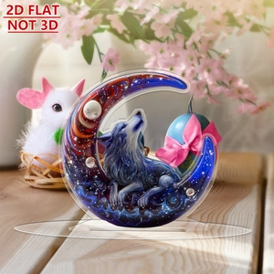 Detail of 2D flat acrylic ornament with moon and wolf galaxy design on a wooden desk