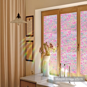 Kitchen window film detail featuring floral static cling and rainbow light refraction