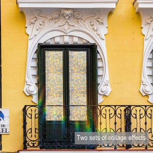 Detail showing two sets of yellow floral window film on a black frame double glass door