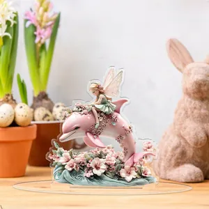 Detailed 2D flat acrylic ornament showing a pink dolphin with fairy in home setting