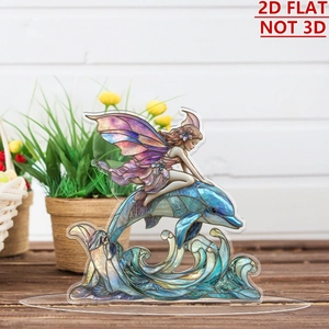 Detailed 2D acrylic ornament showing a fairy riding a dolphin in stained glass style
