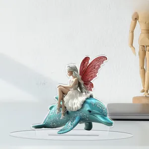 Detailed 2D flat acrylic stand of a fairy riding a blue dolphin for home desktop decor