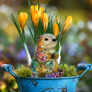 Exquisite crystal resin otter figurine with colorful rhinestones in a garden pot