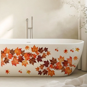 Detail showing waterproof maple leaf and berry stickers on a modern white bathtub