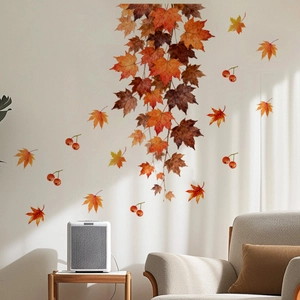 Detail of autumn maple leaves and red berries wall decals in a minimalist living room