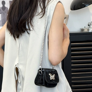 Mini black saddle bag for women with silver butterfly buckle and metal chain strap