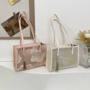 Elegant Chinese style tote bag with floral embroidery and silk tassels in pink and green