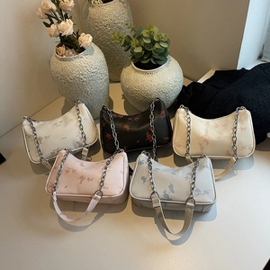 Floral print hobo shoulder bags in five colors with silver chain straps and butterfly motifs