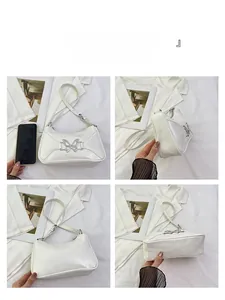 Borsa a spalla bianca con farfalla mostrata da angoli frontale, laterale e fondo