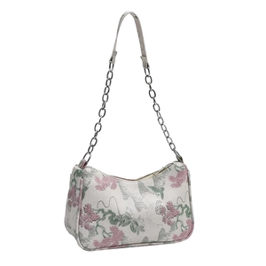 Floral embroidered shoulder bag in cream with pink blossoms and metal chain strap