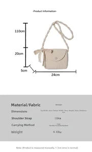 Detail showing dimension specs of cream straw bucket bag with lace bow and pearl clasp