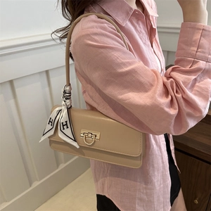 Chic beige leather shoulder bag with decorative H-print silk scarf strap for women