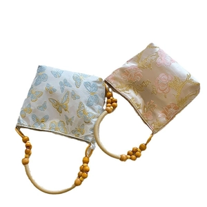 Retro embroidered tote bag with butterfly patterns and decorative wooden beads handles