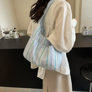 Large capacity canvas tote bag with colorful vertical stripes for daily commuting style
