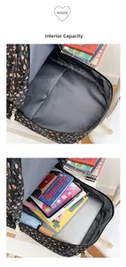 Detail view of the spacious inner compartment with floral print for laptop and books