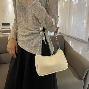 Minimalist cream chain underarm bag for women with silver metal strap and retro style