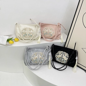 Ethnic style embroidered handbags with floral patterns and tassels in four colors