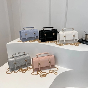 Chic marbled leather crossbody bags in five colors with gold chain straps and top handles