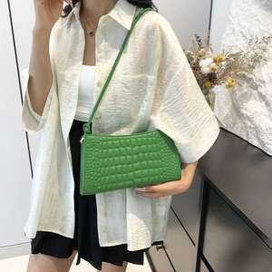 Chic green crocodile embossed underarm bag with matching shoulder strap for women
