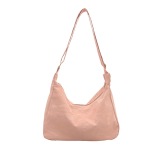 Minimalist light pink crescent tote bag with adjustable strap and textured nylon finish