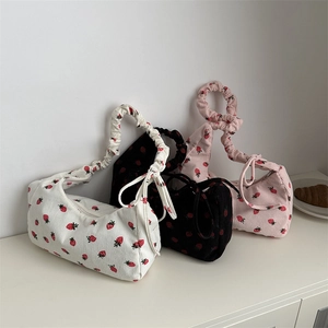 Floral strawberry corduroy tote bags with ruffled handles in white, black, and pink colors