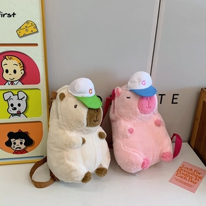 Cute capybara and pink pig plush backpacks featuring stylish baseball caps and soft straps