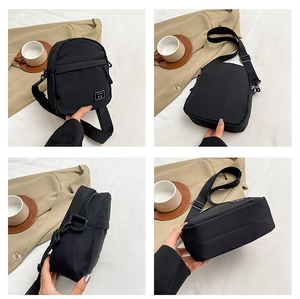 Detail view of black nylon crossbody bag with logo patch from four different angles