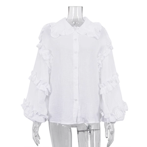 Chemisier blanc en coton à manches lanternes avec col Claudine et détails à volants