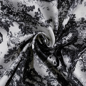 Detalle macro de la tela de satén de seda con patrones clásicos de Toile de Jouy en blanco y negro