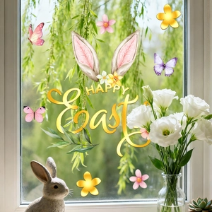 Detail of Happy Easter window stickers with rabbit ears, butterflies and gold lettering