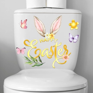 Macro detail of Happy Easter stickers with rabbit ears and flowers on a home surface