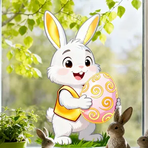 Detail of Easter bunny sticker holding a pink egg on a glass window with soft sunlight