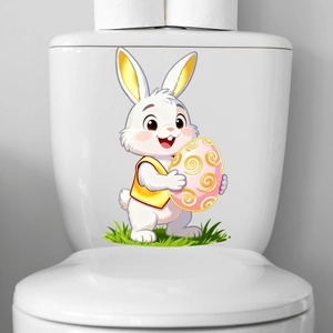 Detail of cute cartoon rabbit decal with Easter egg applied on a smooth white surface