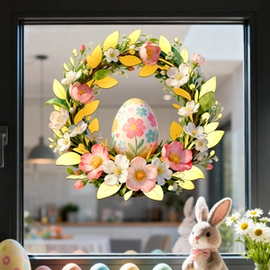 Detail of Easter egg floral wreath window sticker on glass with festive decor